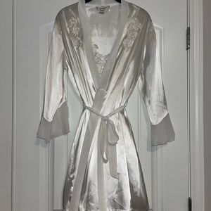 Like new. Beading and lace all perfectly in tacked.